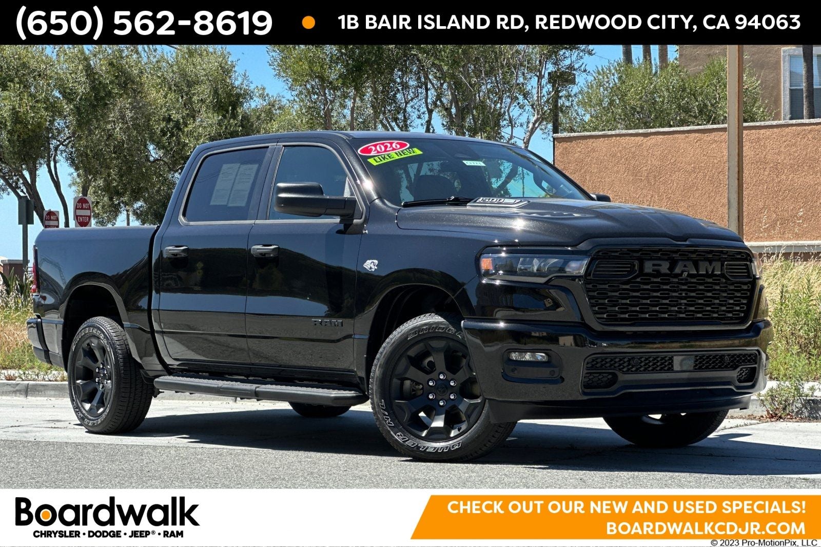 2026 RAM 1500 Express in Diamond Black Crystal Pearlcoat — front three-quarter view