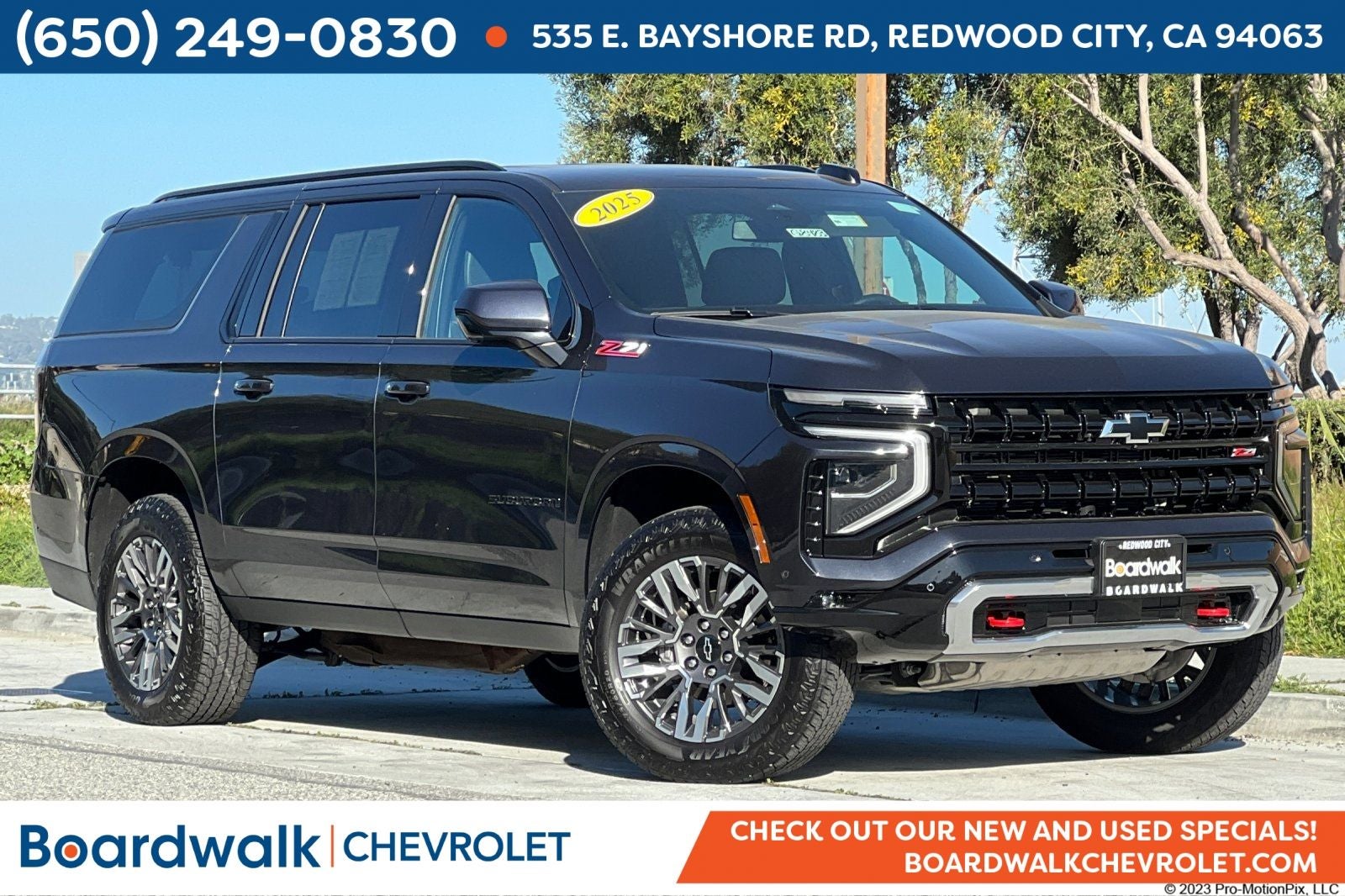 2025 Chevrolet Suburban Z71 in Dark Ash Metallic — front three-quarter view
