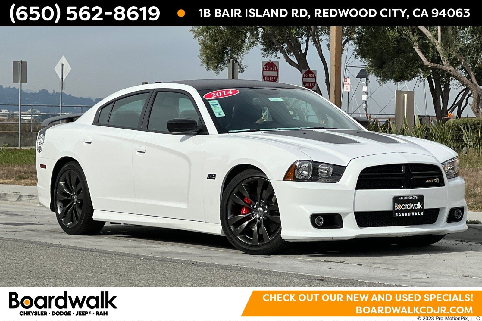 2014 Dodge Charger SRT8 Superbee in Bright White Clearcoat — front three-quarter view
