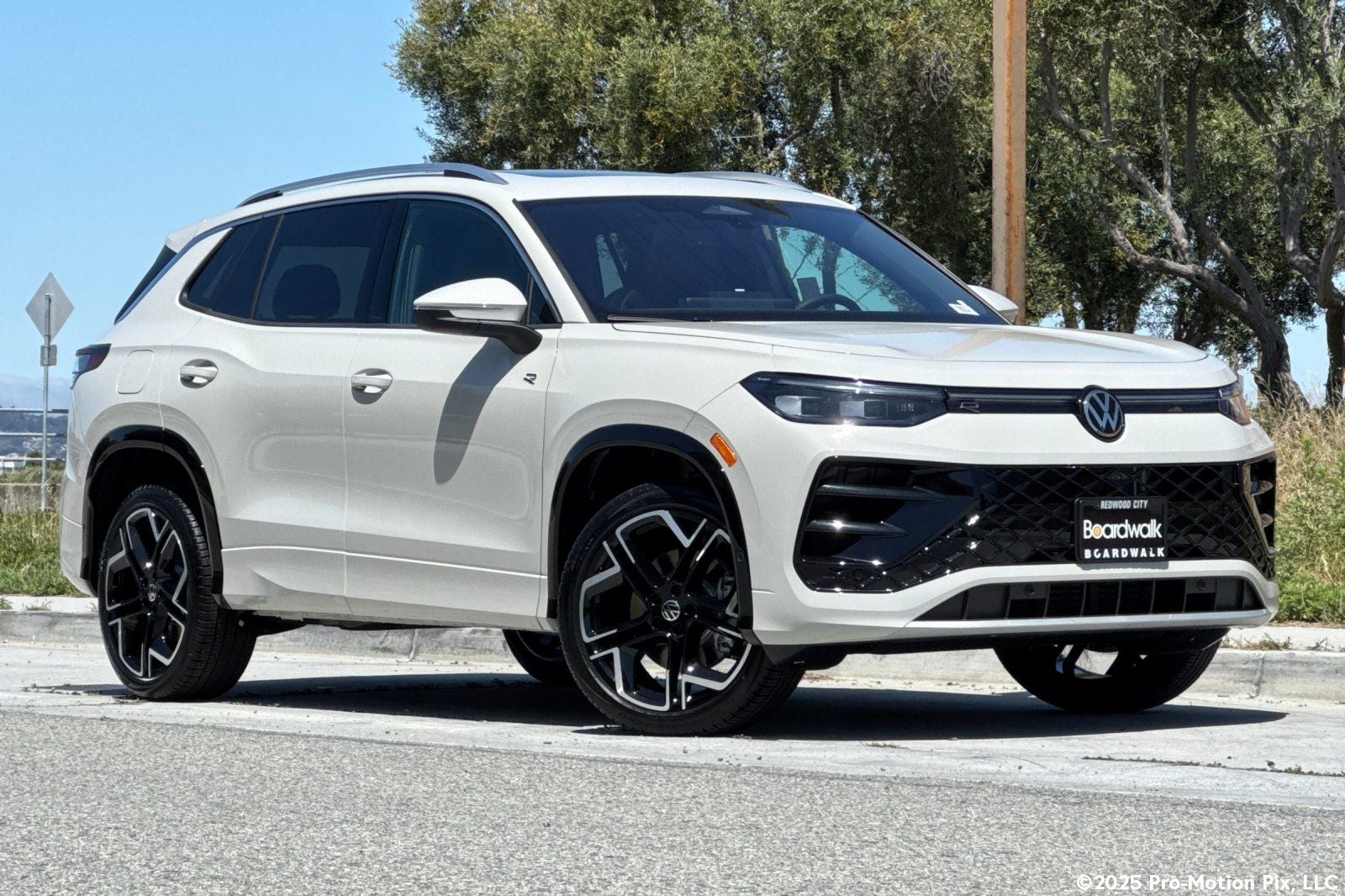 2026 Volkswagen Tiguan 2.0T SEL R-Line in Sandstone — front three-quarter view
