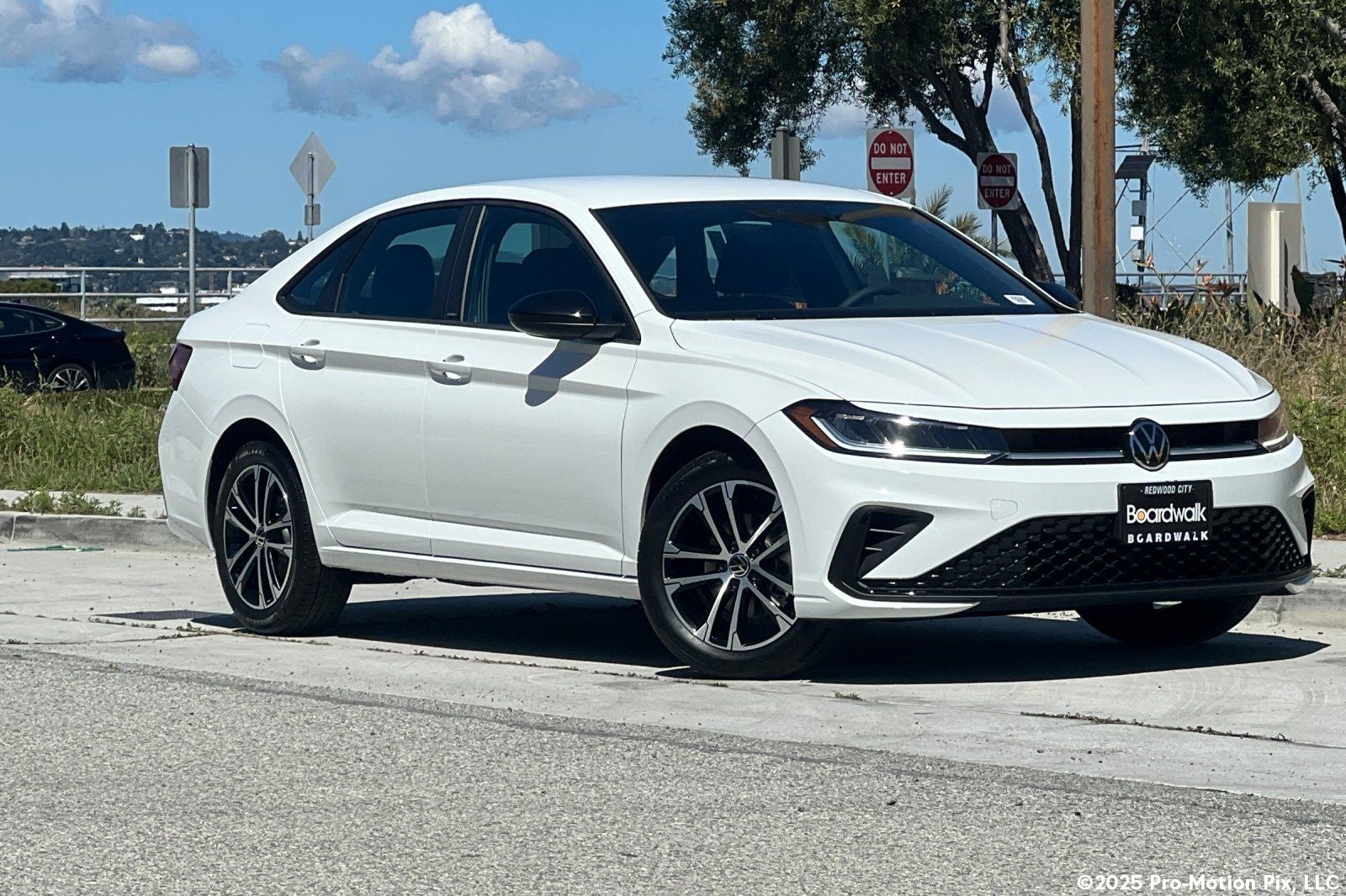 2026 Volkswagen Jetta 1.5T Sport in Pure White — front three-quarter view