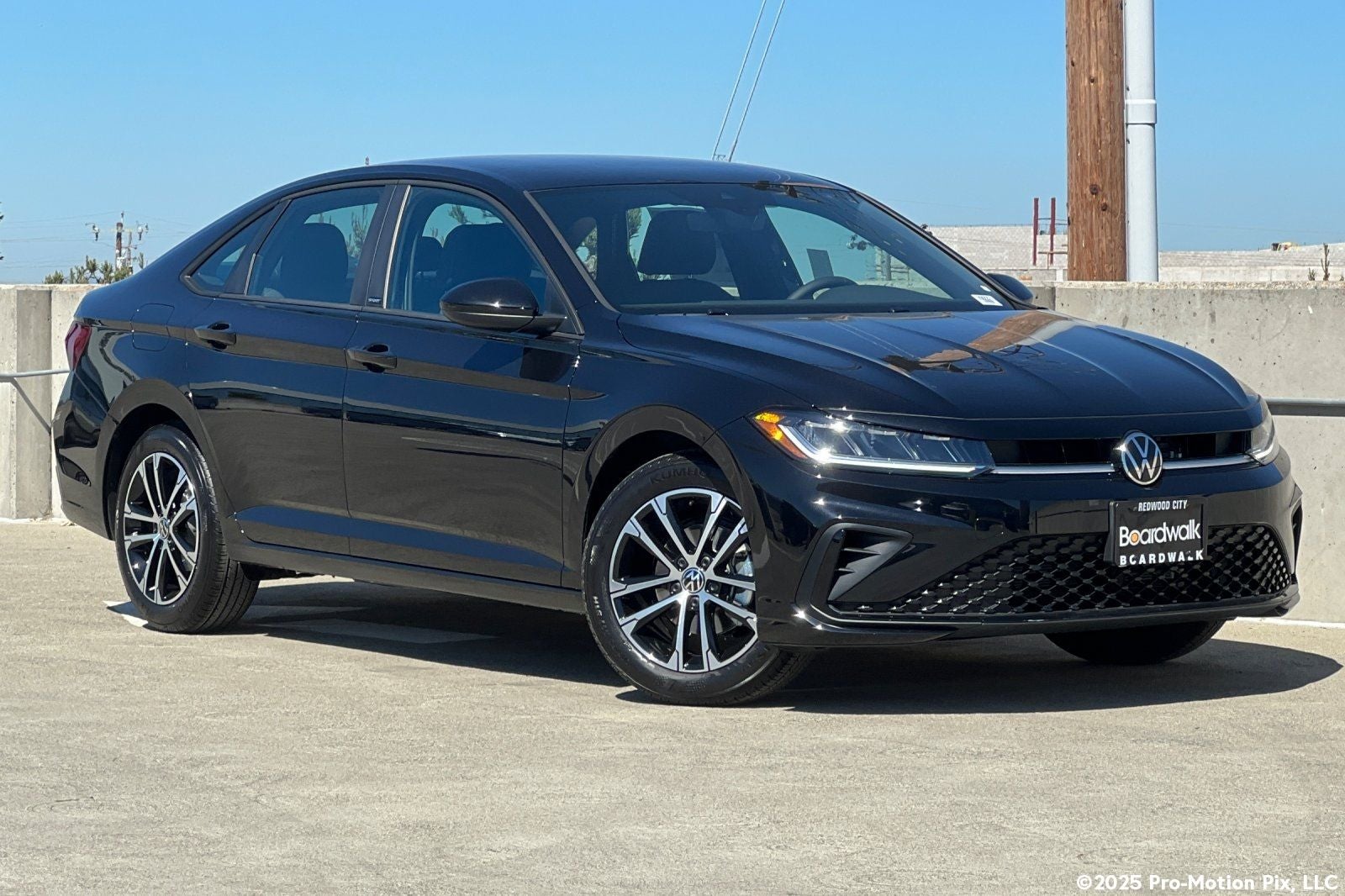 2026 Volkswagen Jetta 1.5T Sport in Deep Black Pearl — front three-quarter view